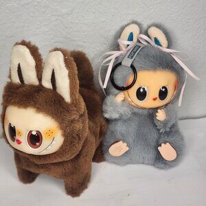 Labubu Collectible Lot: Singing/Walking Dog & Gray Keychain with Pink Ribbons